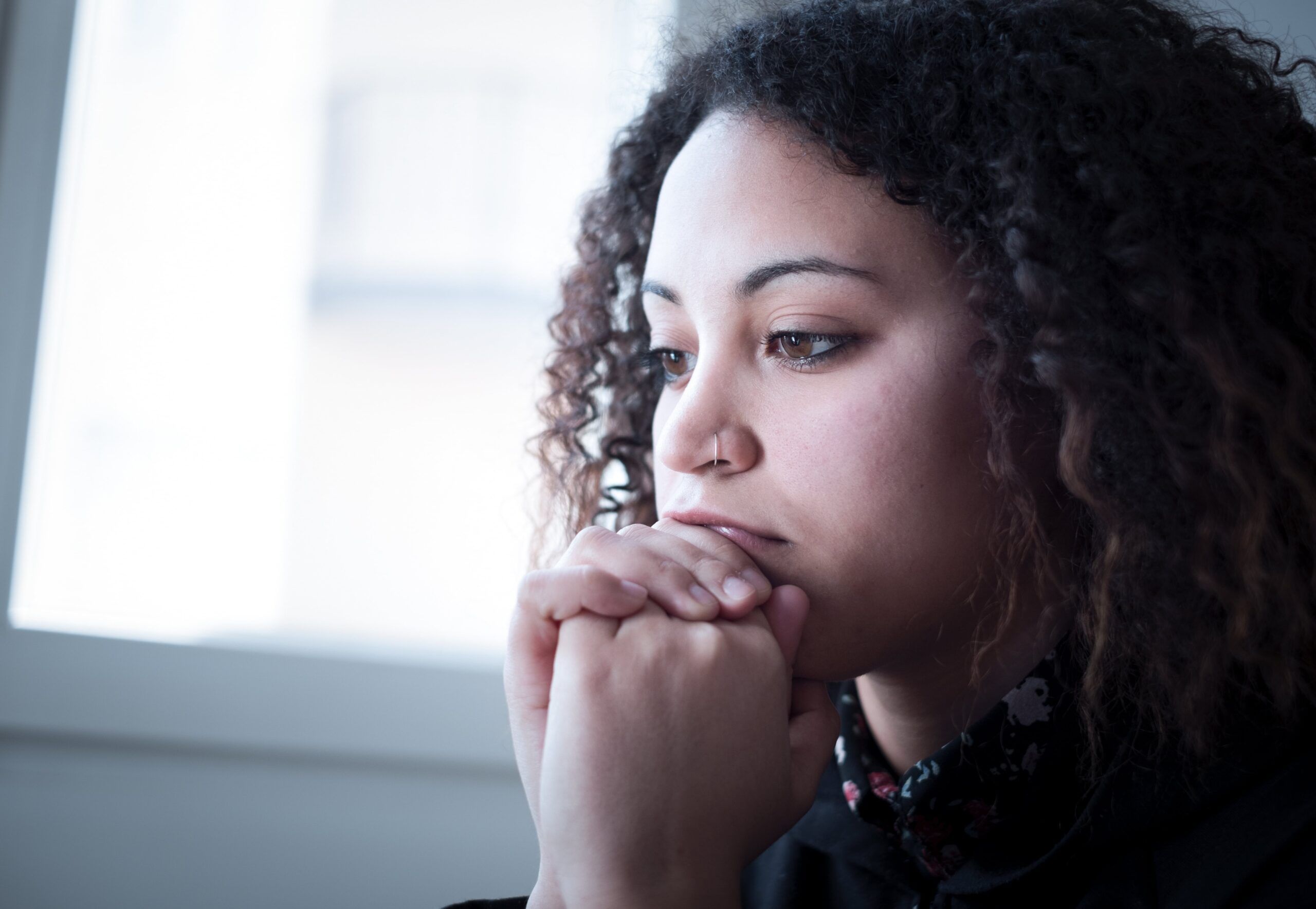 young woman with trauma-related mental health disorder