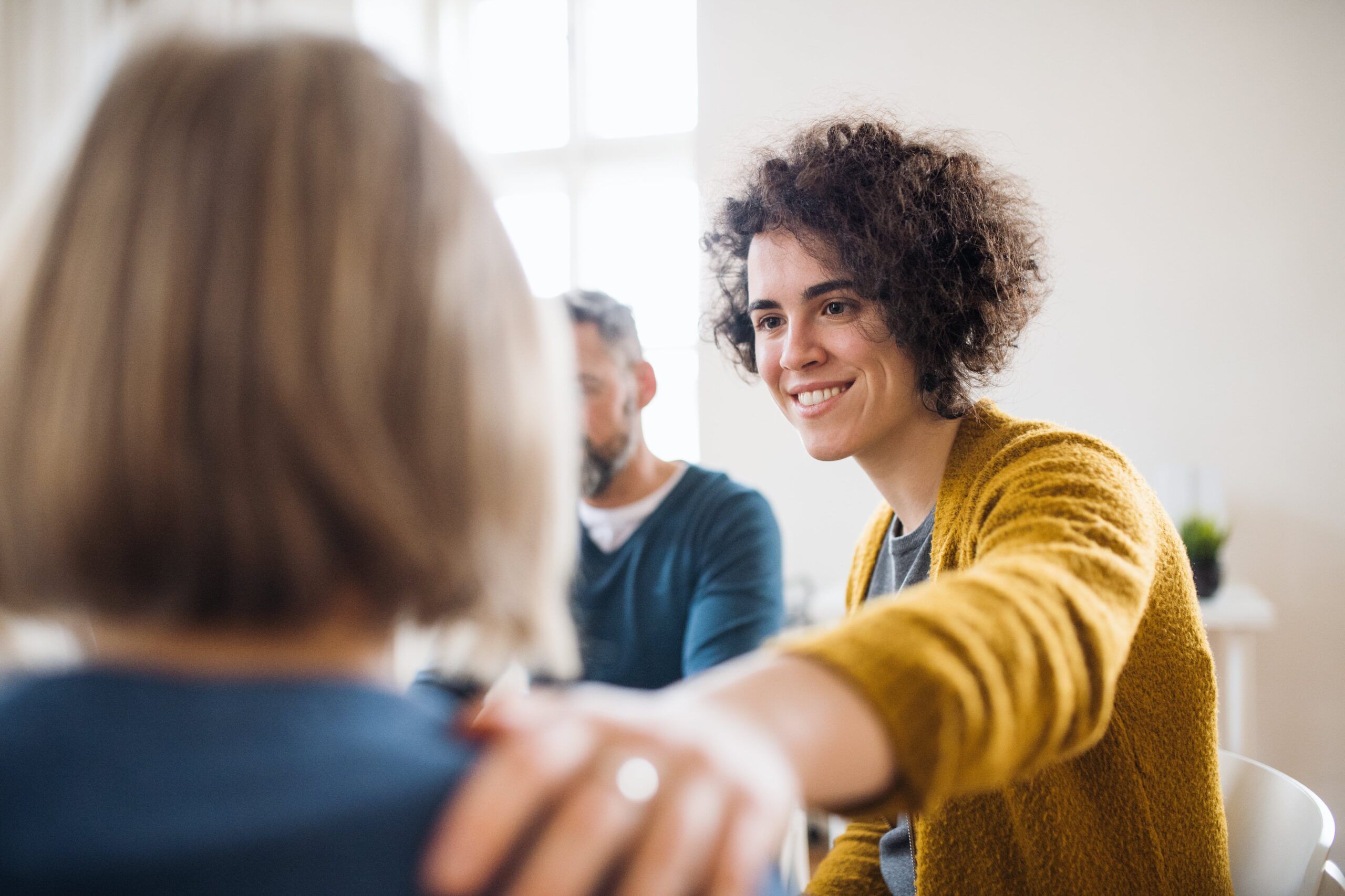 lead therapist in group session